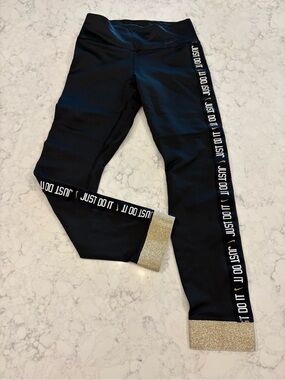 Nike Black 'Just Do It' Leggings with Gold Cuffs